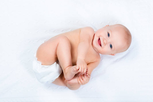 happy toddler in babylux premium nappy as part of a calming bedtime routine